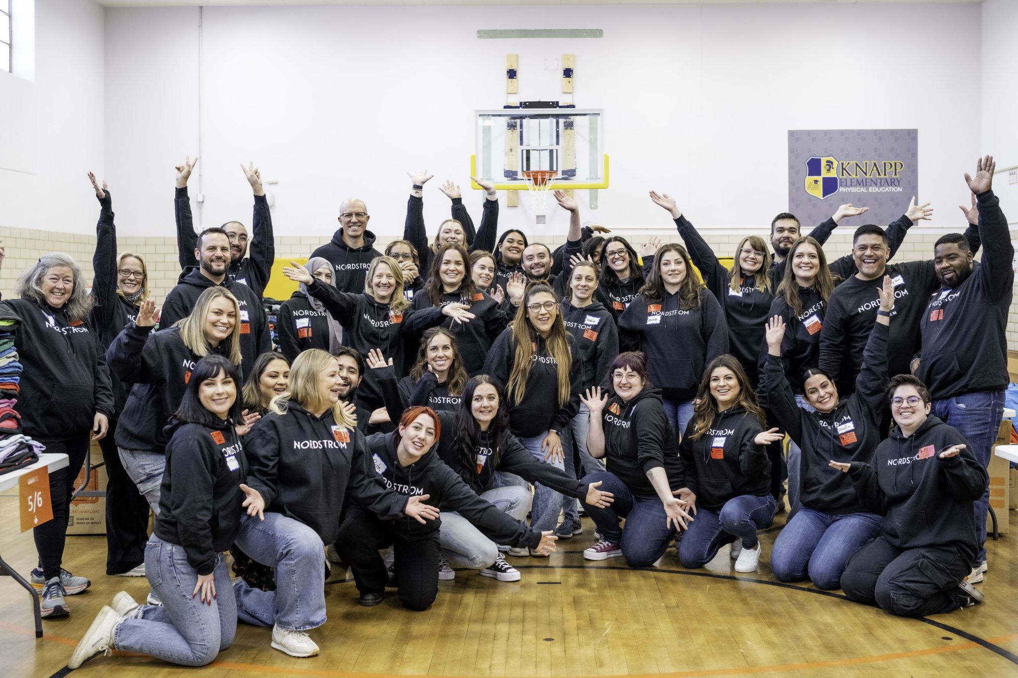 Nordstrom employee volunteers at an Operation Warm event