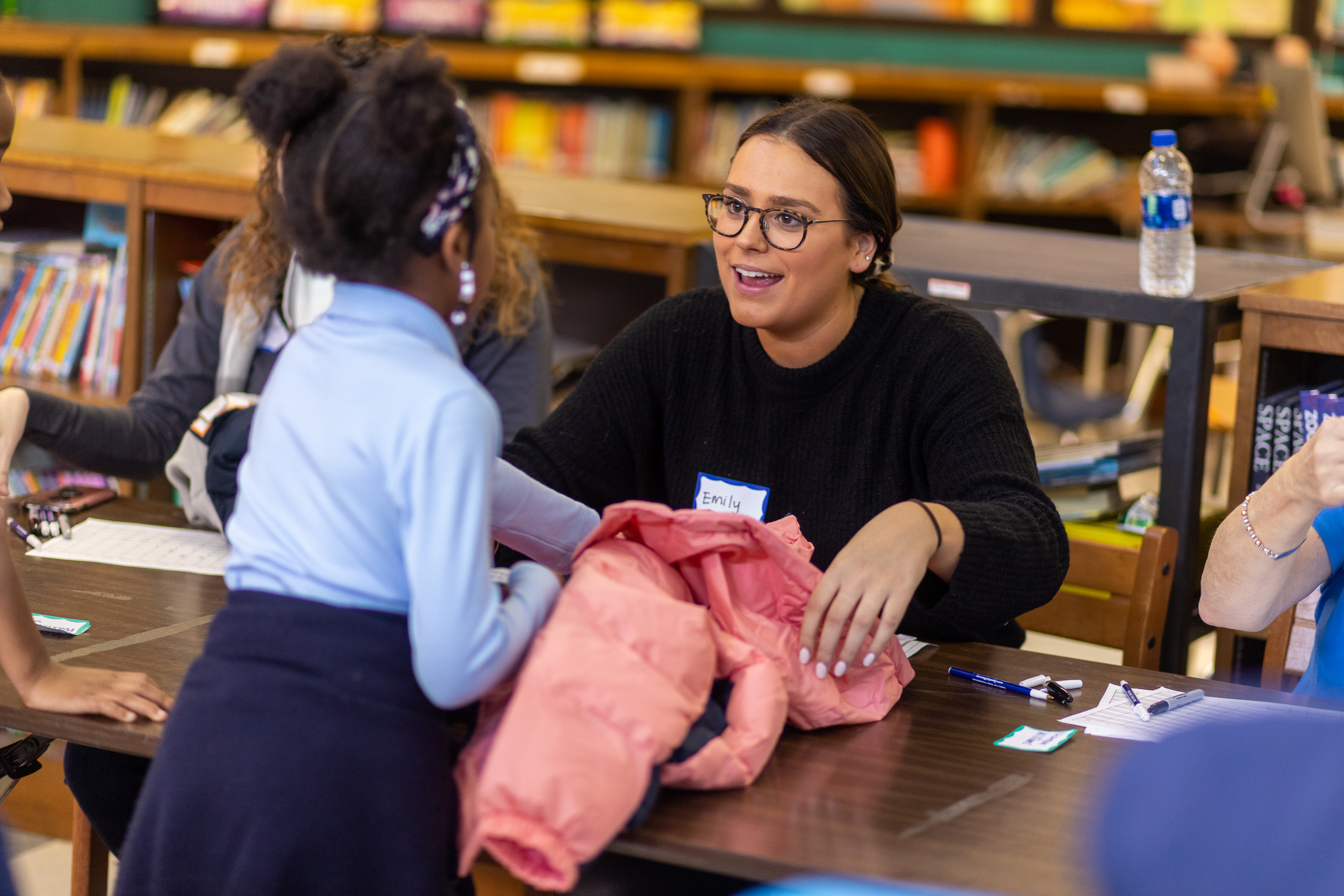 volunteer at operation warm event gifting free coats to kids